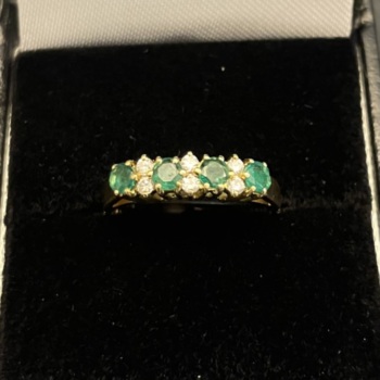 18ct yellow gold pre-loved emerald and diamond half eternity ring.