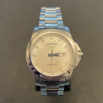 Ladies pre-loved steel Longines watch with mother of pearl diamond dot dial. 