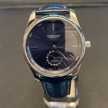 Gents pre-loved steel automatic Longines watch on black leather strap. 