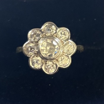 18ct white gold daisy cluster ring. total diamond weight 1.3ct