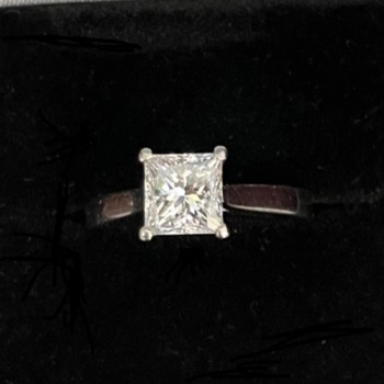 Platinum single stone princess cut diamond ring. Diamond weight 1.5ct.