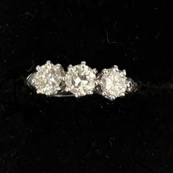 Platinum 3 stone diamond ring.