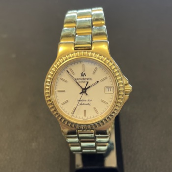Yellow gold plated pre-loved Raymond Weil gents watch.
