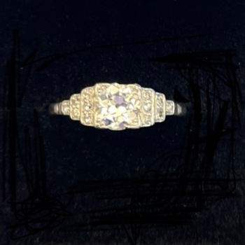 Platinum pre-loved Art Deco diamond ring. Principal diamond is 0.75ct.