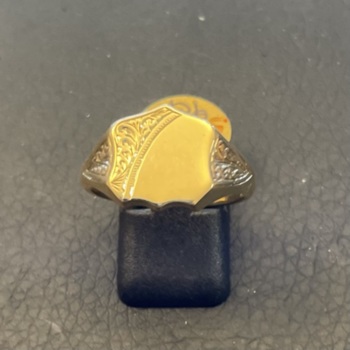 9ct yellow gold shield shaped engraved signet ring.