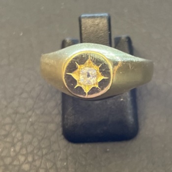 18ct yellow gold diamond set signet ring.
